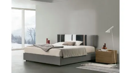 Letto sommier Diagonal con box contenitore e pannello testiera di Tomasella